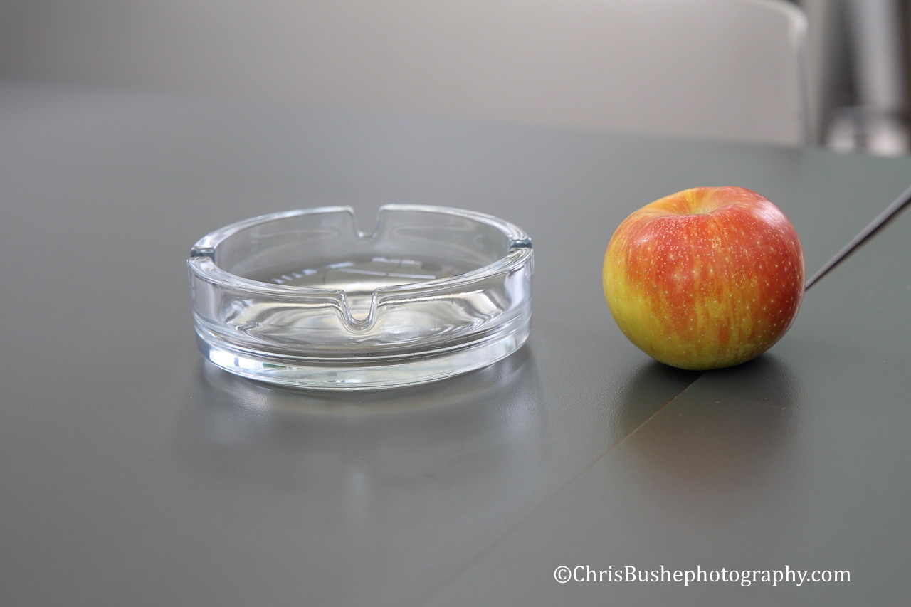 An apple and an Ashtray on every table in Ljubljana