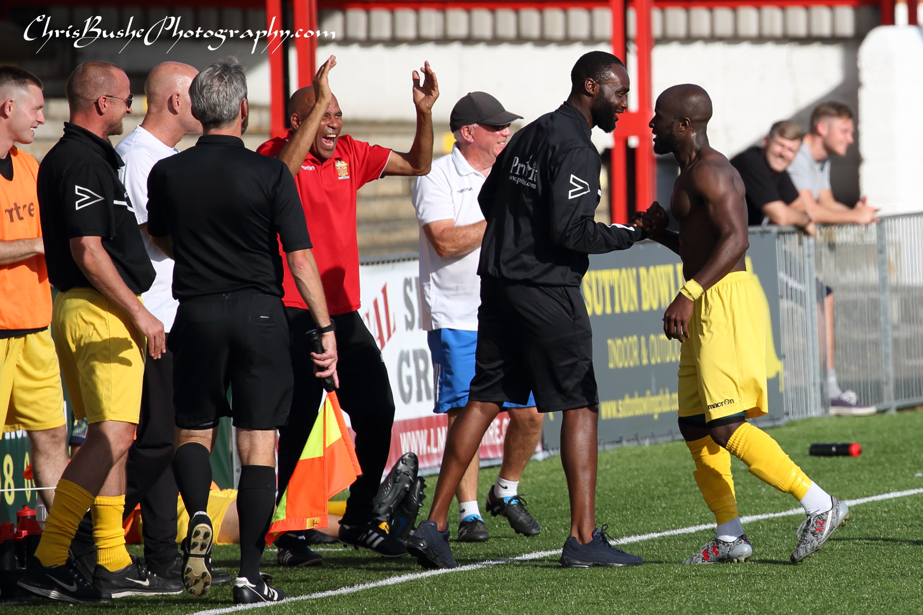 uchechi celebrating with his bench